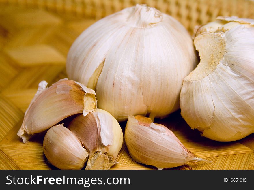 Garlics in the basket close up