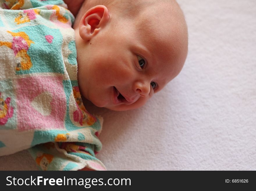 Baby is smiling on white background. Baby is smiling on white background.