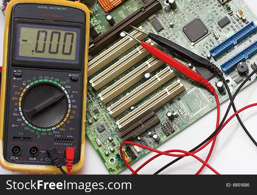 Memory Circuit Board Close Up with multimeter. Memory Circuit Board Close Up with multimeter