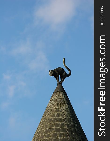 Rooftop with a cat figure in the Old Town of Riga (Latvia)