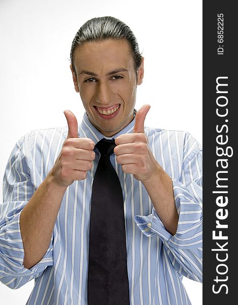 Businessman gesturing thumbs up on an isolated white background