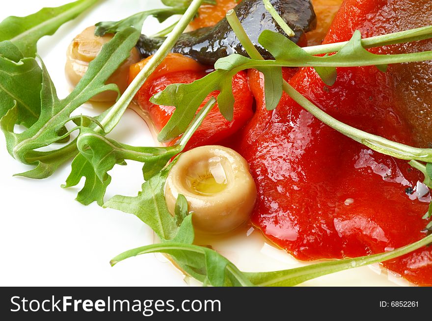 Appetizer with fresh rocket salad, stewed red sweet pepper and mushrooms. Appetizer with fresh rocket salad, stewed red sweet pepper and mushrooms