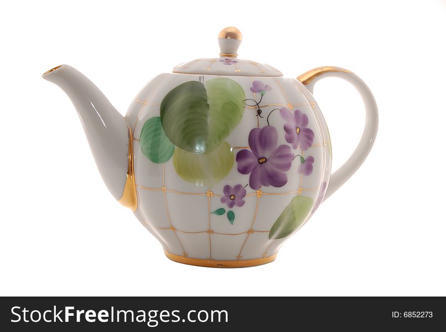 Porcelain teapot isolated on a white