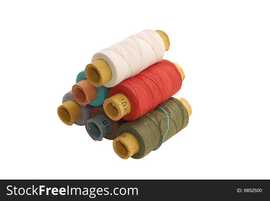 Spools with threads isolated on the white