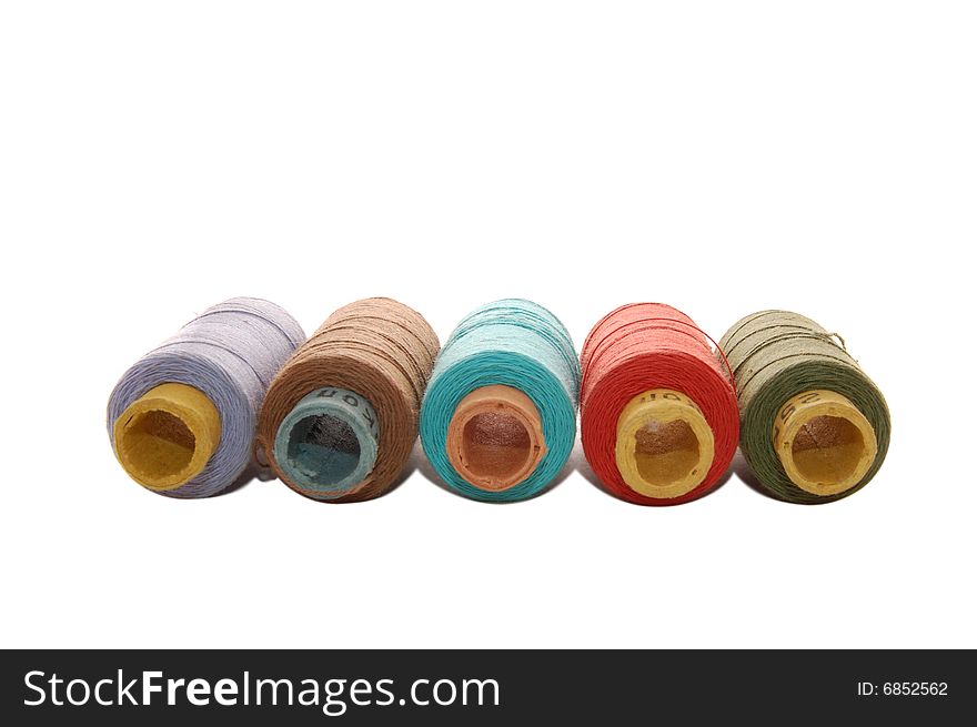 Spools with threads isolated on the white