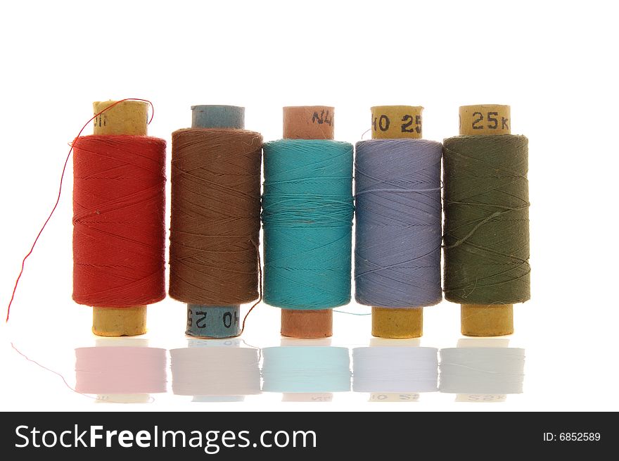 Spools with threads isolated on the white