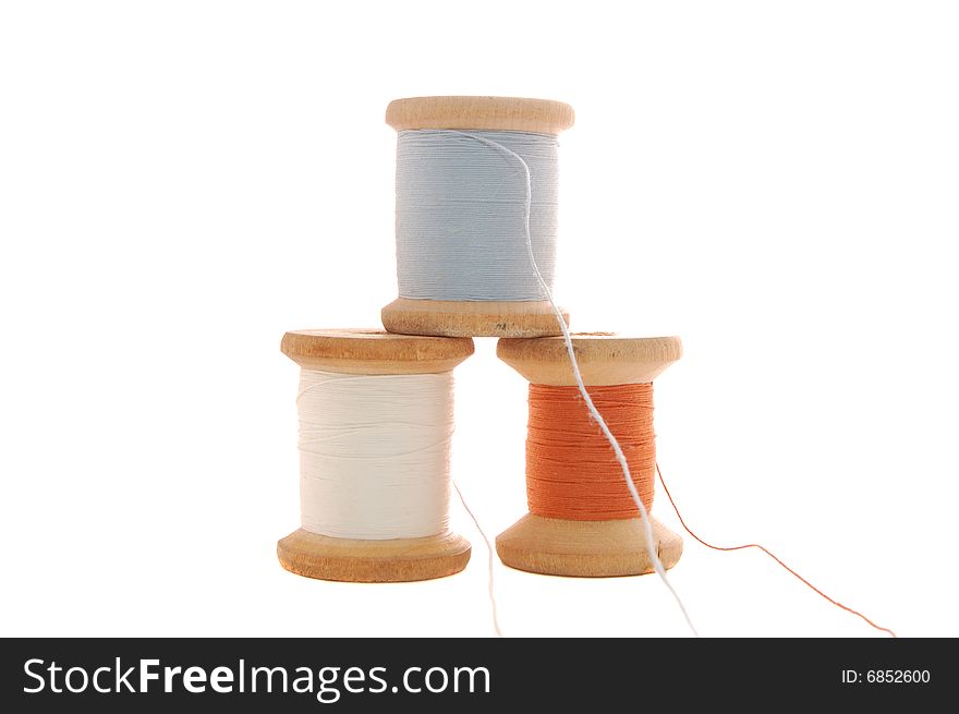 Spools with threads isolated on the white