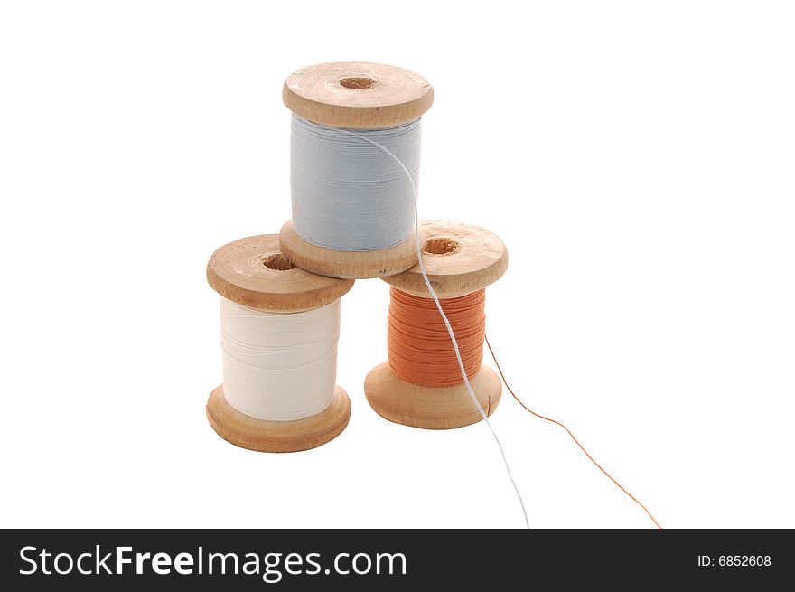 Spools with threads isolated on the white