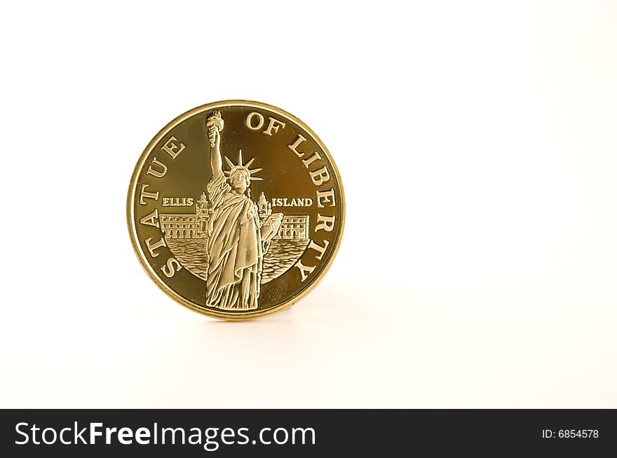 Golden plated coin witn Statue of Liberty. Golden plated coin witn Statue of Liberty