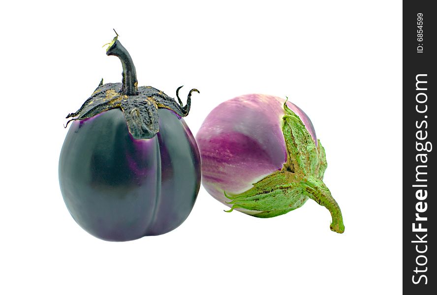 Two motley round eggplants isolated on a white background