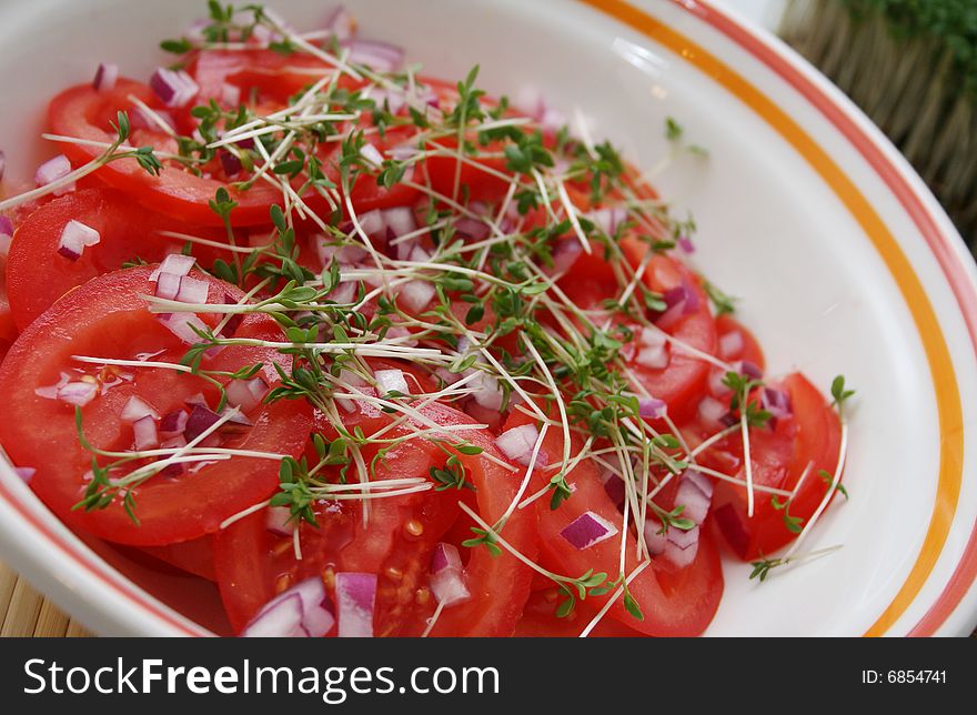 A fresh salad of tomatoes with some spices