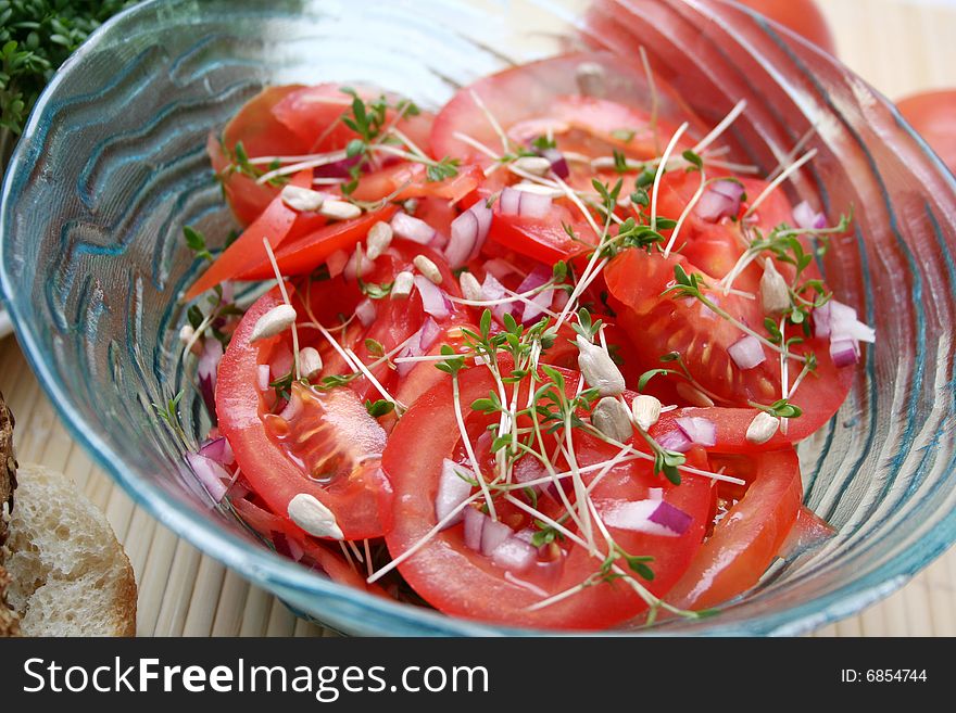 A fresh salad of tomatoes with some spices