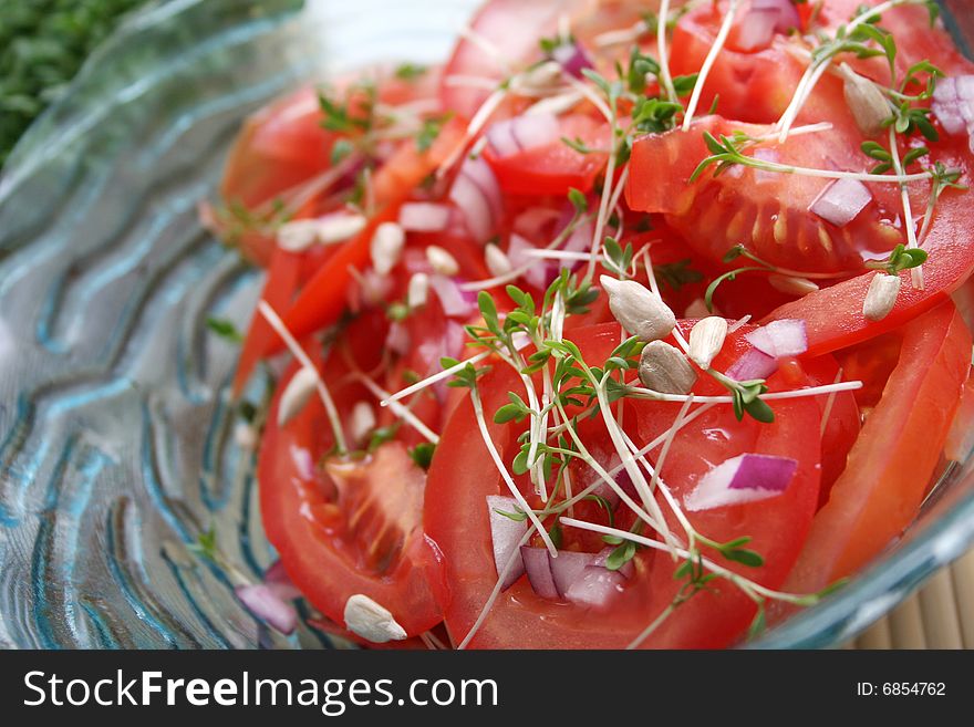 A fresh salad of tomatoes with some spices
