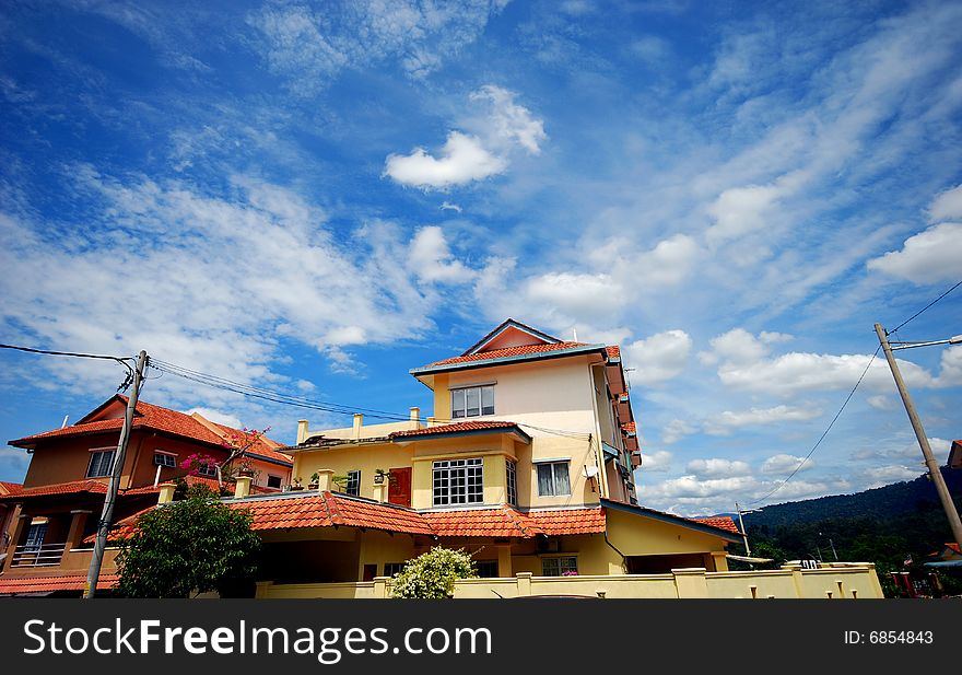 A house image on the blue sky background
