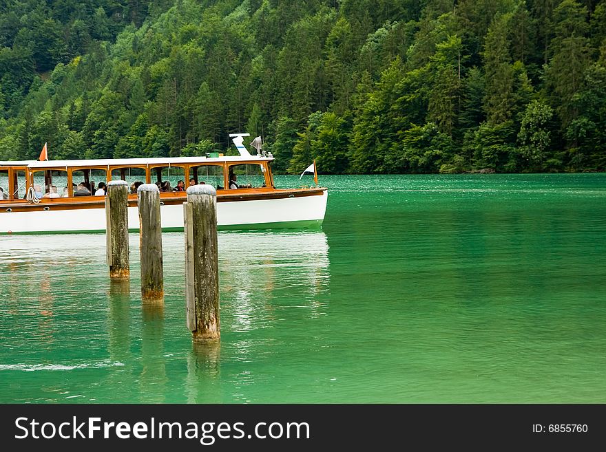 Cruise boat on a green lake. Cruise boat on a green lake