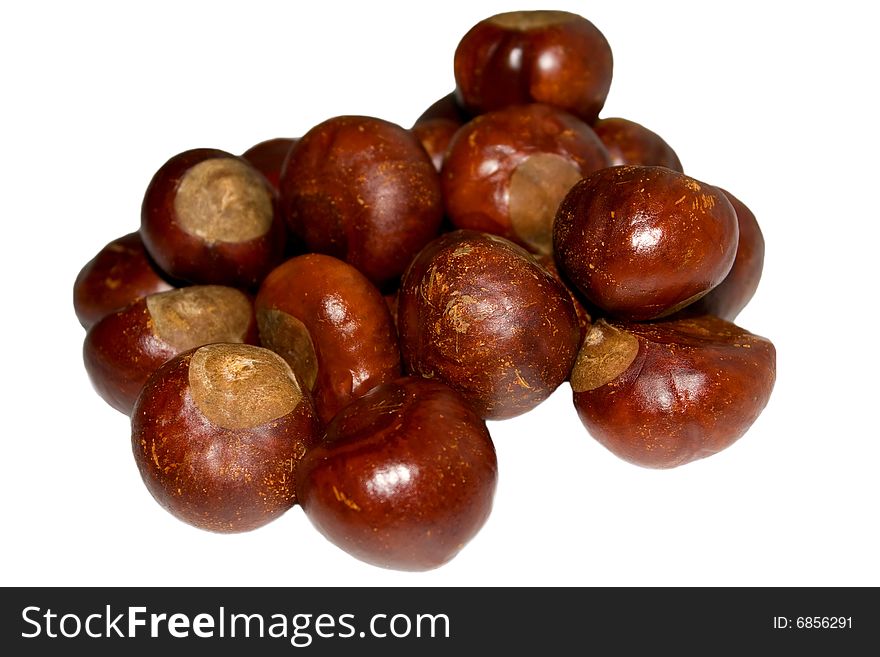 Composition of chestnuts isolated on white background