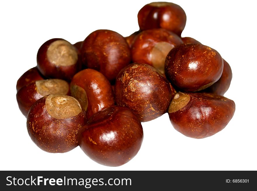 Composition of chestnuts isolated on white background