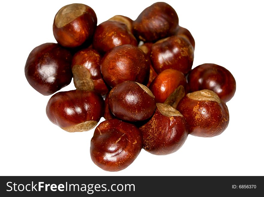Composition of chestnuts isolated on white background