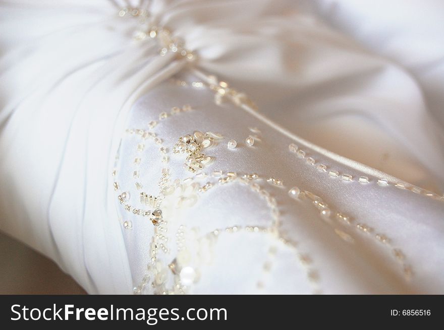 Detail of a wedding dress before the wedding. Detail of a wedding dress before the wedding