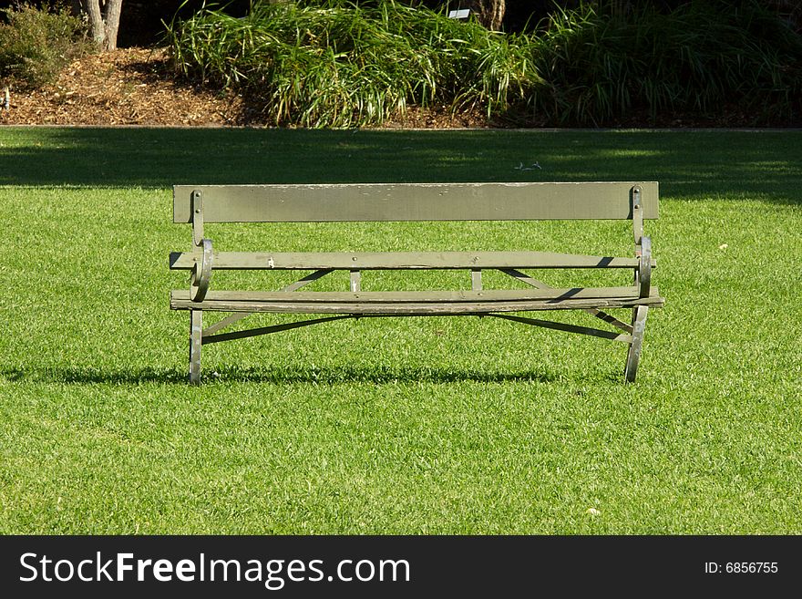 Bench in the middle of the lawn. Bench in the middle of the lawn