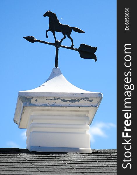 Weathervane on top of small barn