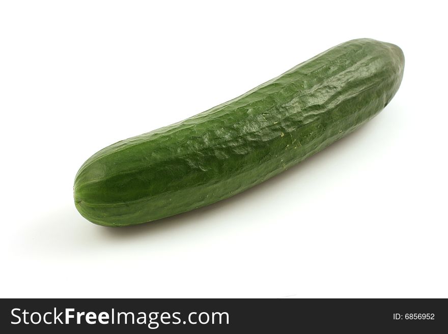 Green long cucumber isolated on white in studio