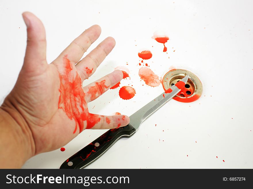 Bloodied Knife and Hand