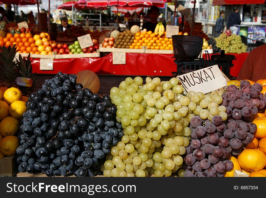 Display of fresh colourful grapes on market in Europe