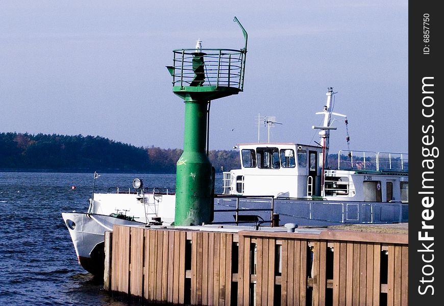 Small lighthouse and boat