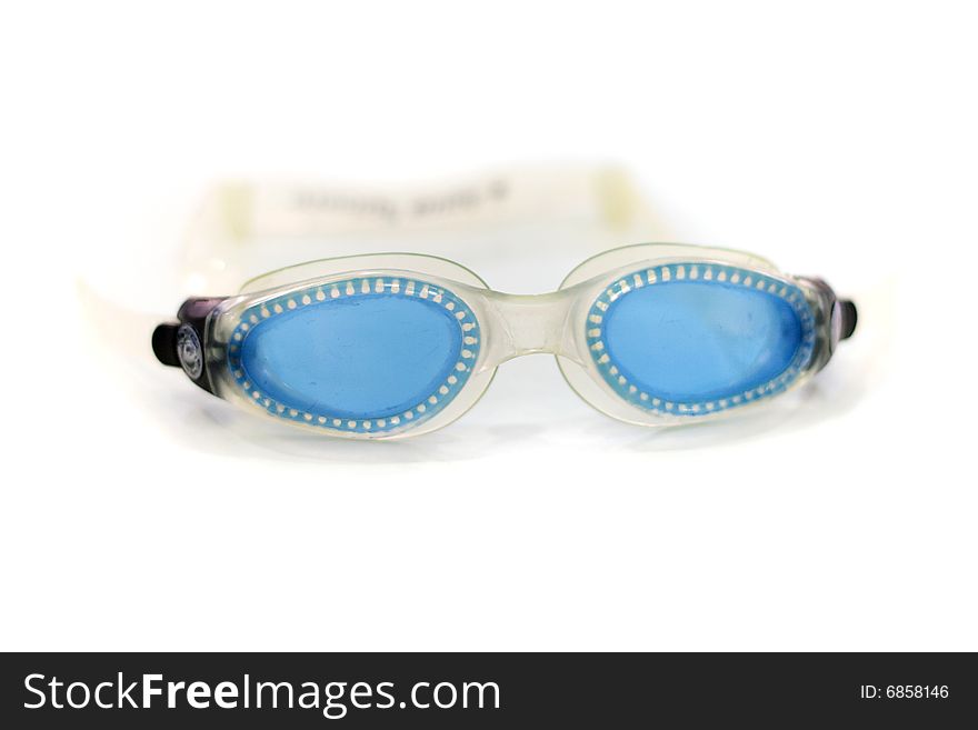 Blue glasses for swim on white