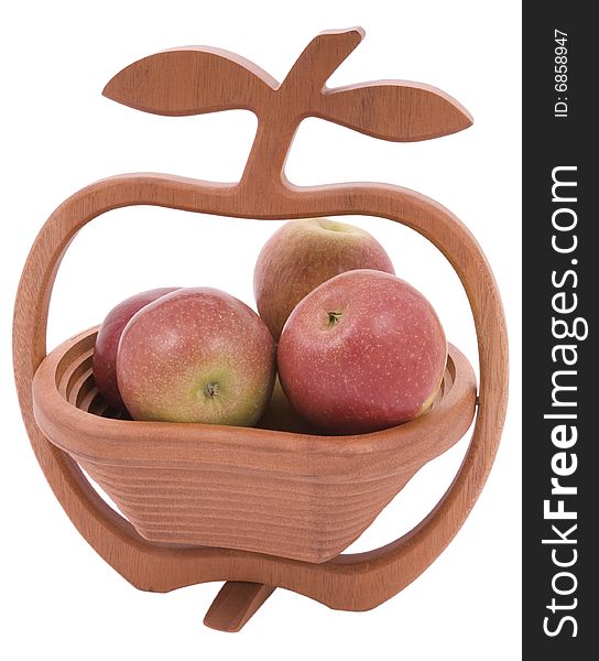Apple shaped wooden bowl full of apples