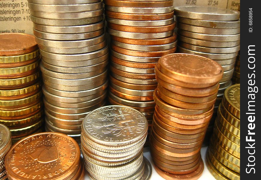 Stacks of different coins from Europe and Canada. Stacks of different coins from Europe and Canada