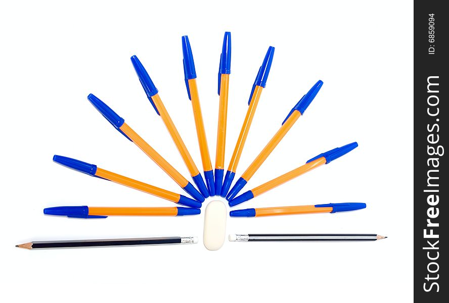 Pens and pencils isolated on white