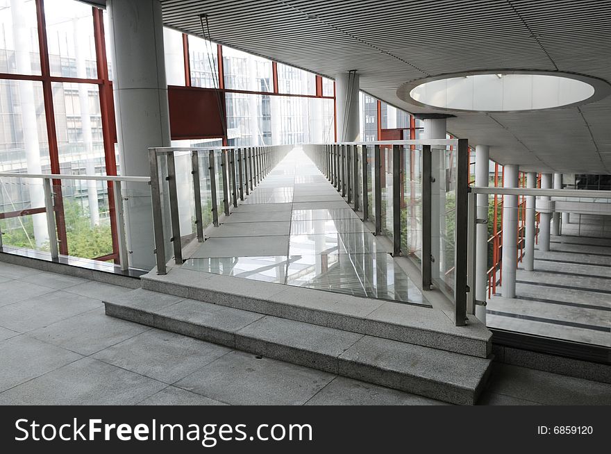 The corridor in a modern building compound. The corridor in a modern building compound.