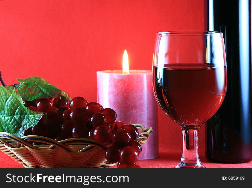 Red Wine with Wine Bottle on Table