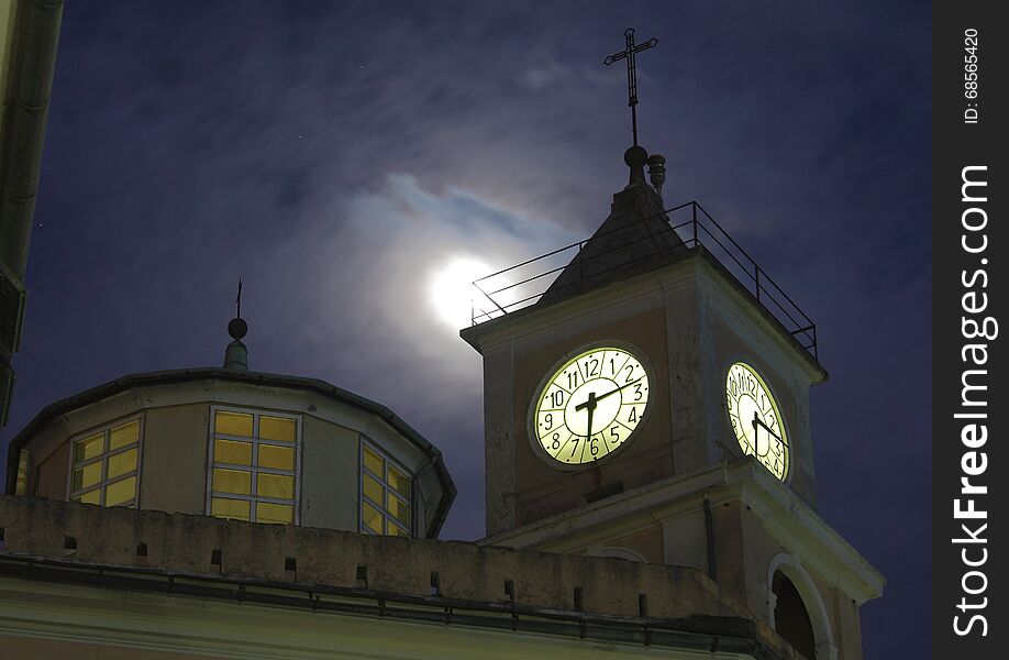 The bell tower , the moon and the night