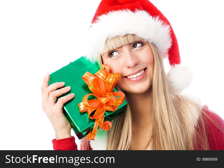 Pretty blond girl with a Christmas present