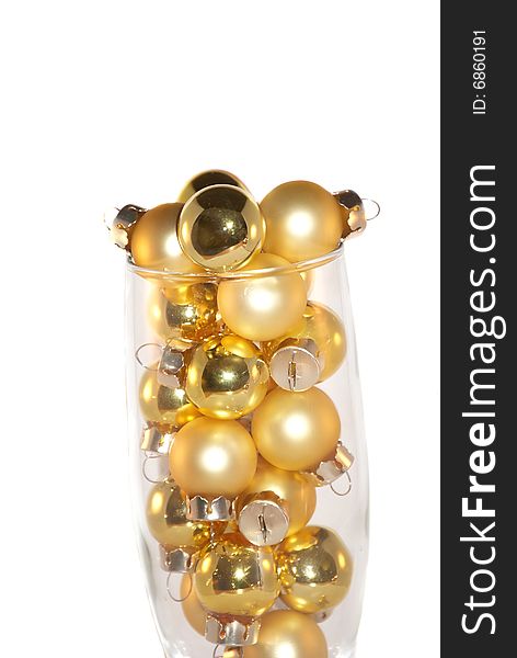 Christmas gold ornaments imitated glass with champagne. Christmas gold ornaments imitated glass with champagne.