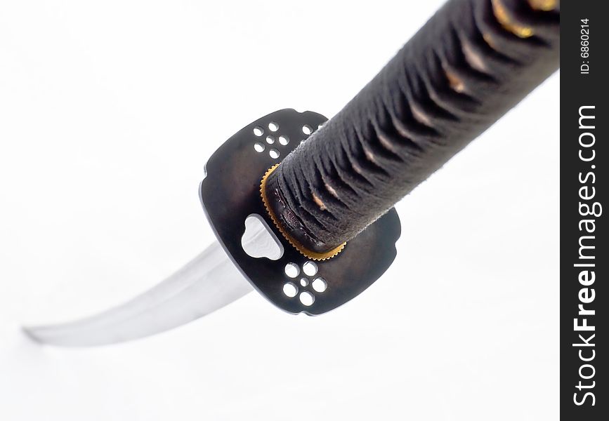 Japanese sword katana isolated on white.Focus on the protection