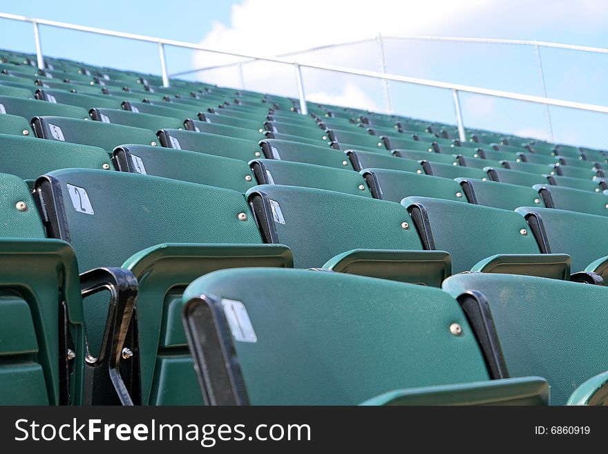 Empty seats at a sports stadium. Empty seats at a sports stadium