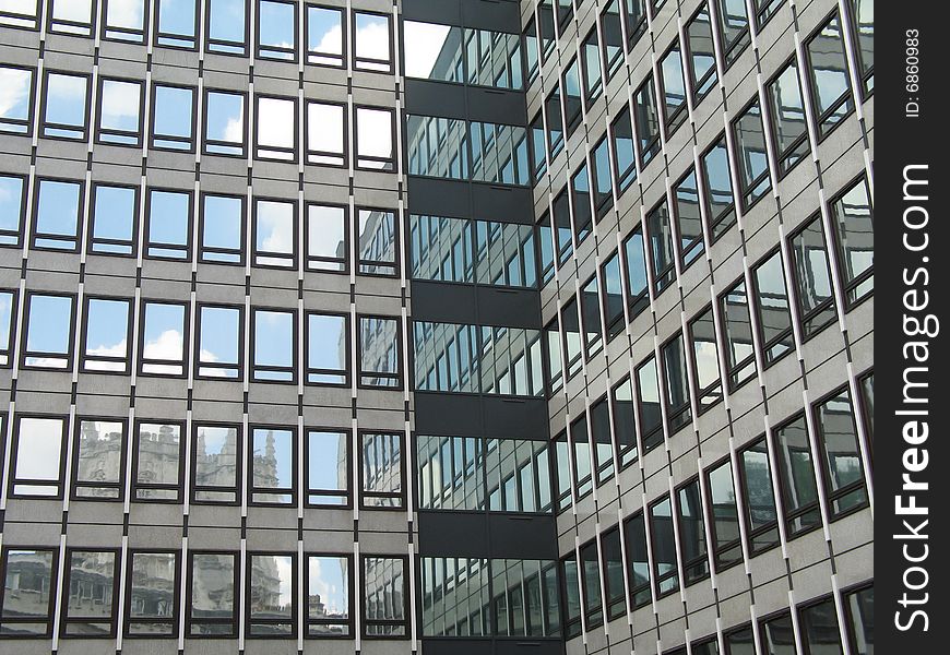 Glass modern building with reflection