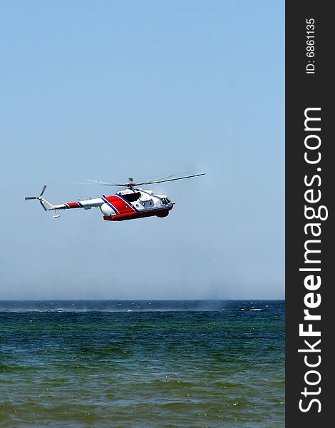 Rescue helicopter in the sea