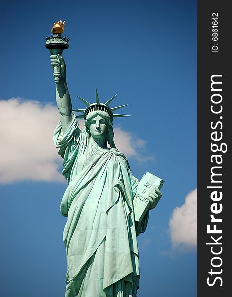 Statue of Liberty against blue sky in New York