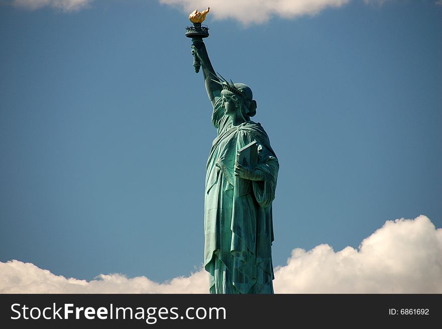 Statue of Liberty against blue sky in New York