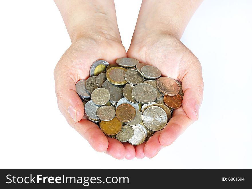 Hands holding  coins isolated on white. Hands holding  coins isolated on white