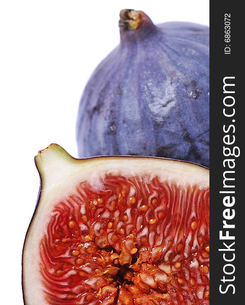 Close up of fresh figs isolated on white background