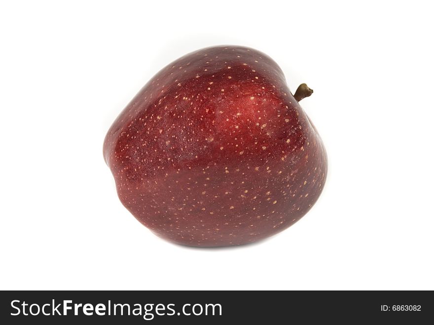 A red delicious apple on white. A red delicious apple on white