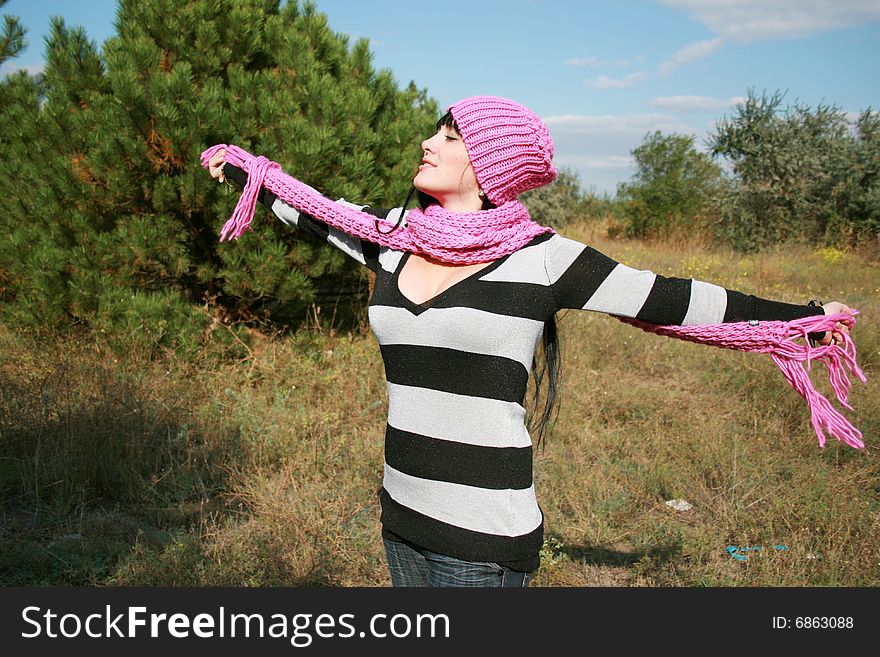 Young beautiful woman in a red cap