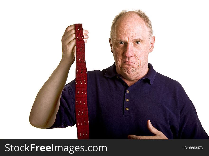 An older bald guy showing his dislike for a tie. An older bald guy showing his dislike for a tie