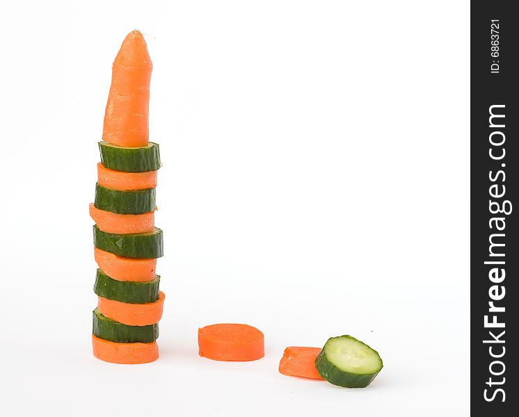 Pile of pieces of carrot and cucumber